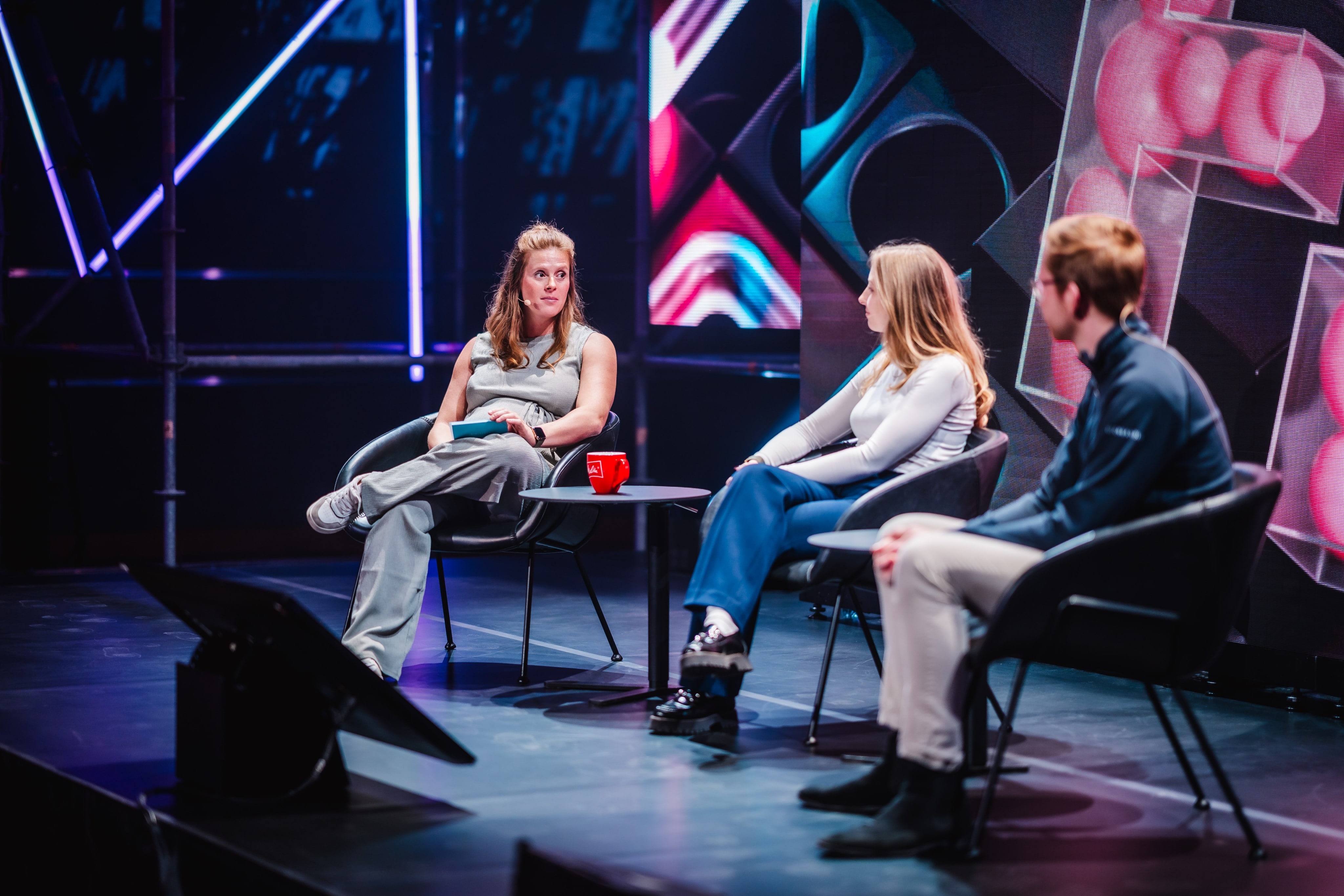 Panel discussion with andRobin on a tech stage